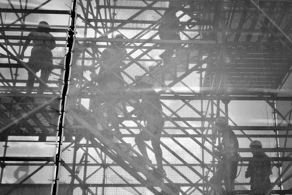 Construction workers on stairs